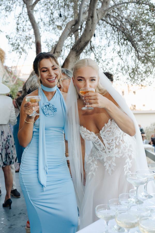 wedding party, greek island, syros, bride, white gown, champagne, greek wedding