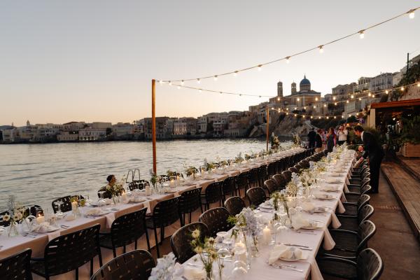 table dressing, sea, string lights, greek wedding, syros, wedding dinner, flower decoration