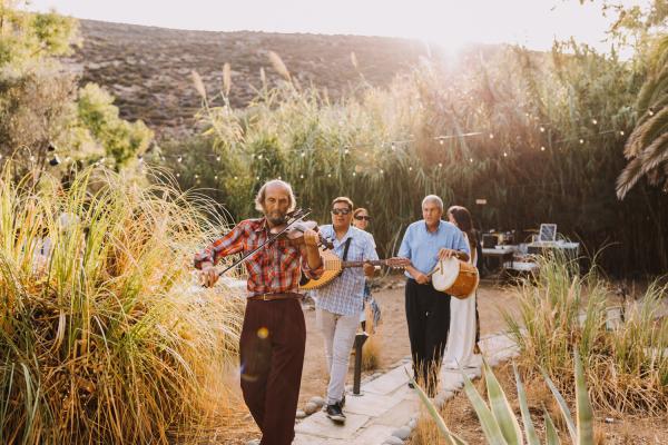 traditional greek musicians, serifos, greek island, wedding ceremony, exchange of vows, greek wedding, nature, outdoor venue, nature eco living, greece