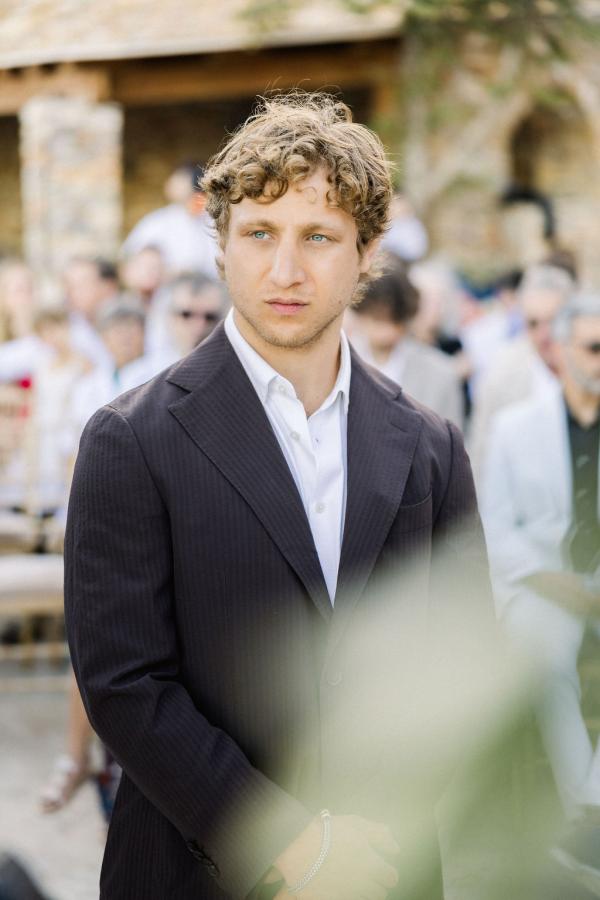 greek wedding, greek island, wedding venue, wedding ceremony, exchange of vows, union, wedding outfit, groom, wedding suit