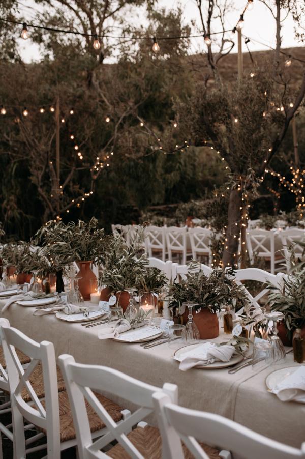 Greek wedding, Greek island, Serifos, wedding venue, nature, wedding decoration, tablesetting, string lights, ceramic vases, olive branches 