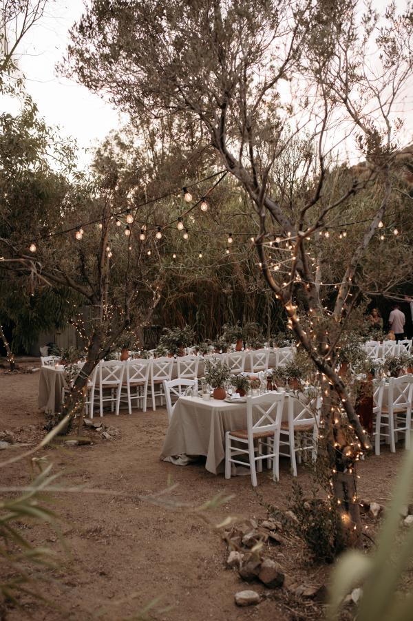 Greek wedding, Greek island, Serifos, wedding venue, nature, wedding decoration, tablesetting, string lights, ceramic vases, olive branches 