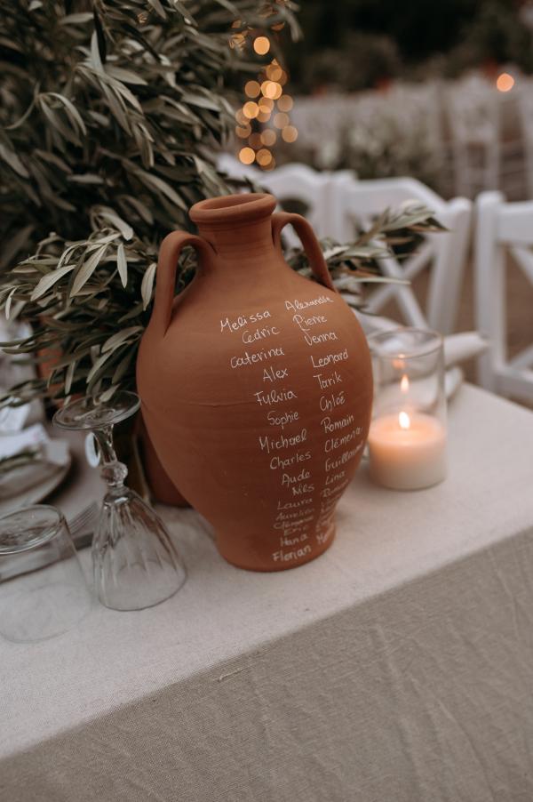 Greek wedding, Greek island, Serifos, wedding venue, nature, wedding decoration, tablesetting, candles, ceramic vases, olive branches 